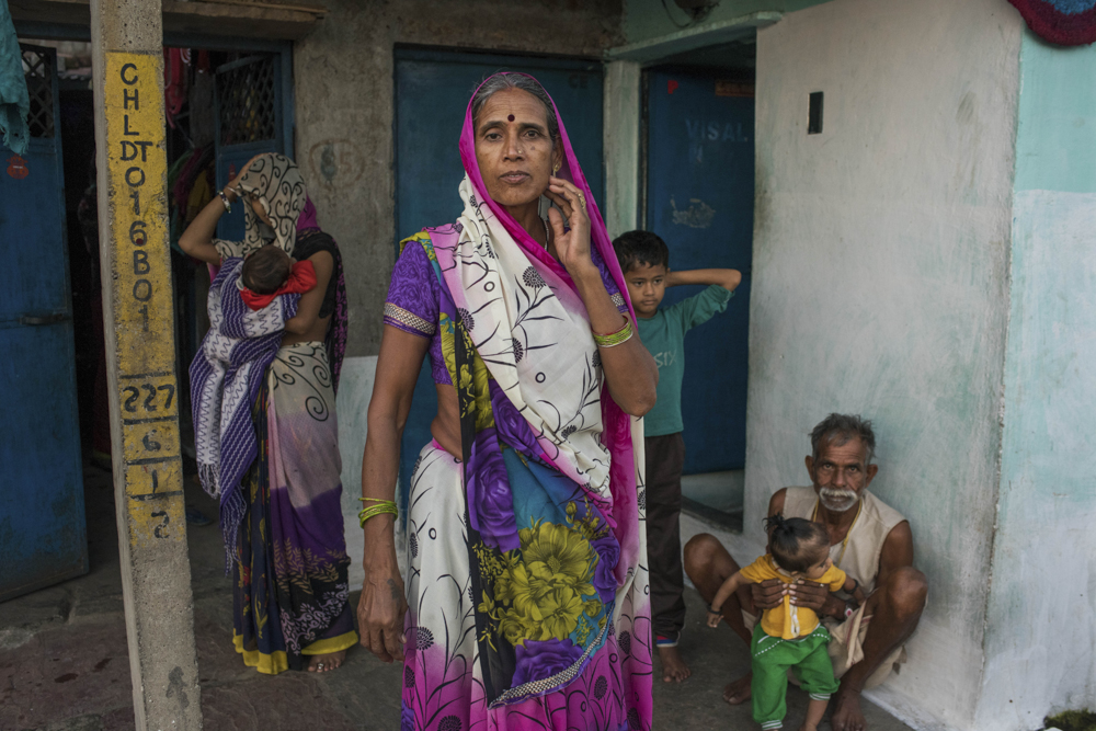  India, Bhopal, 04 October 2016

A family in a Bhopal slum stands outside their home toilet. Health and work has improved dramatically since toilets came to their area.

Andrea Bruce / NOOR 
