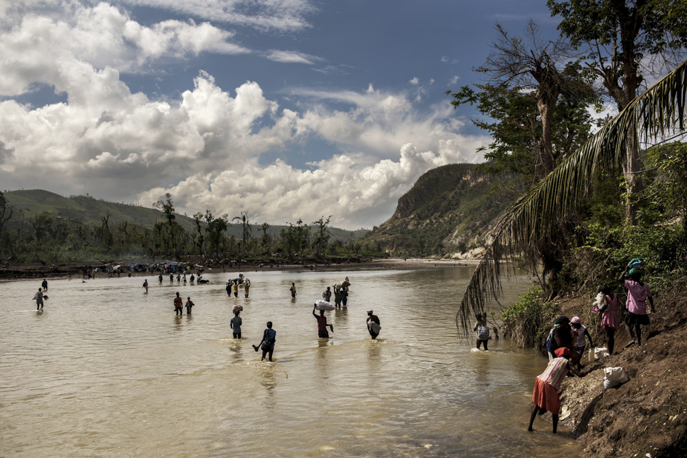  Haiti, Moron, 16 November 2016

A river in remote southern Haiti was finally crossable after a couple days without rain. Residents from nearby remote villages were finally able to cross to buy and sell goods. 

Hurricane Matthew caused mass destruct