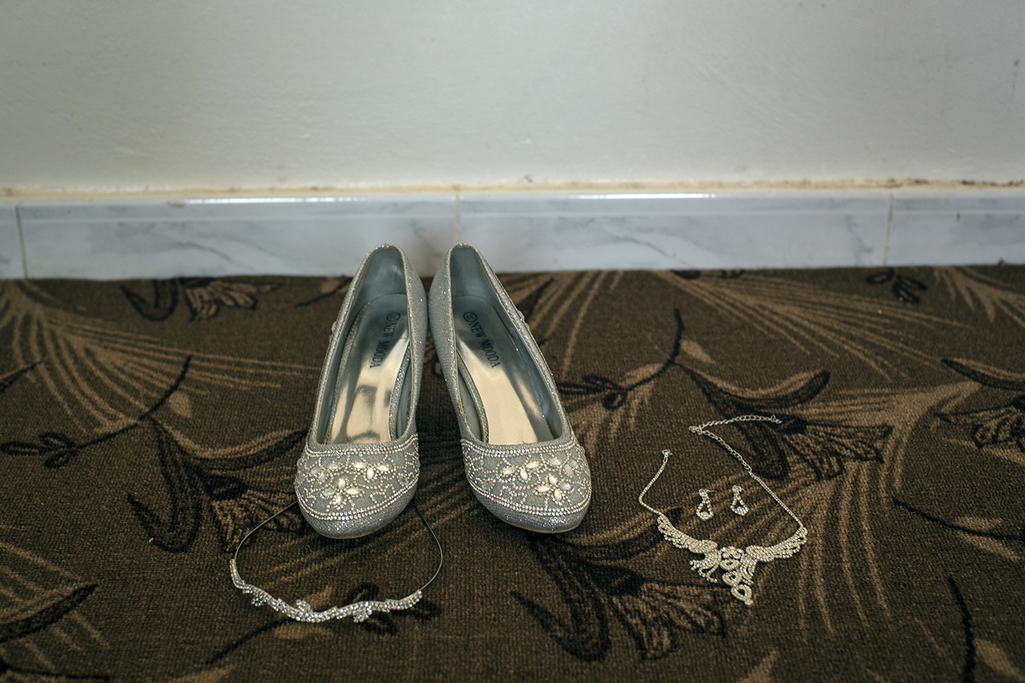  The dress was a rental, but Hala’s “Cinderella” shoes and costume wedding jewelry remain with her. 