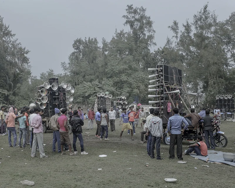 India, Bakkhali, December 2015. Extravagant loudspeakers come with nearly every picnic group. Transported in their own hand drawn carts or mini-vans, separate generators are also brought along to pump up the electricity in the great outdoors.