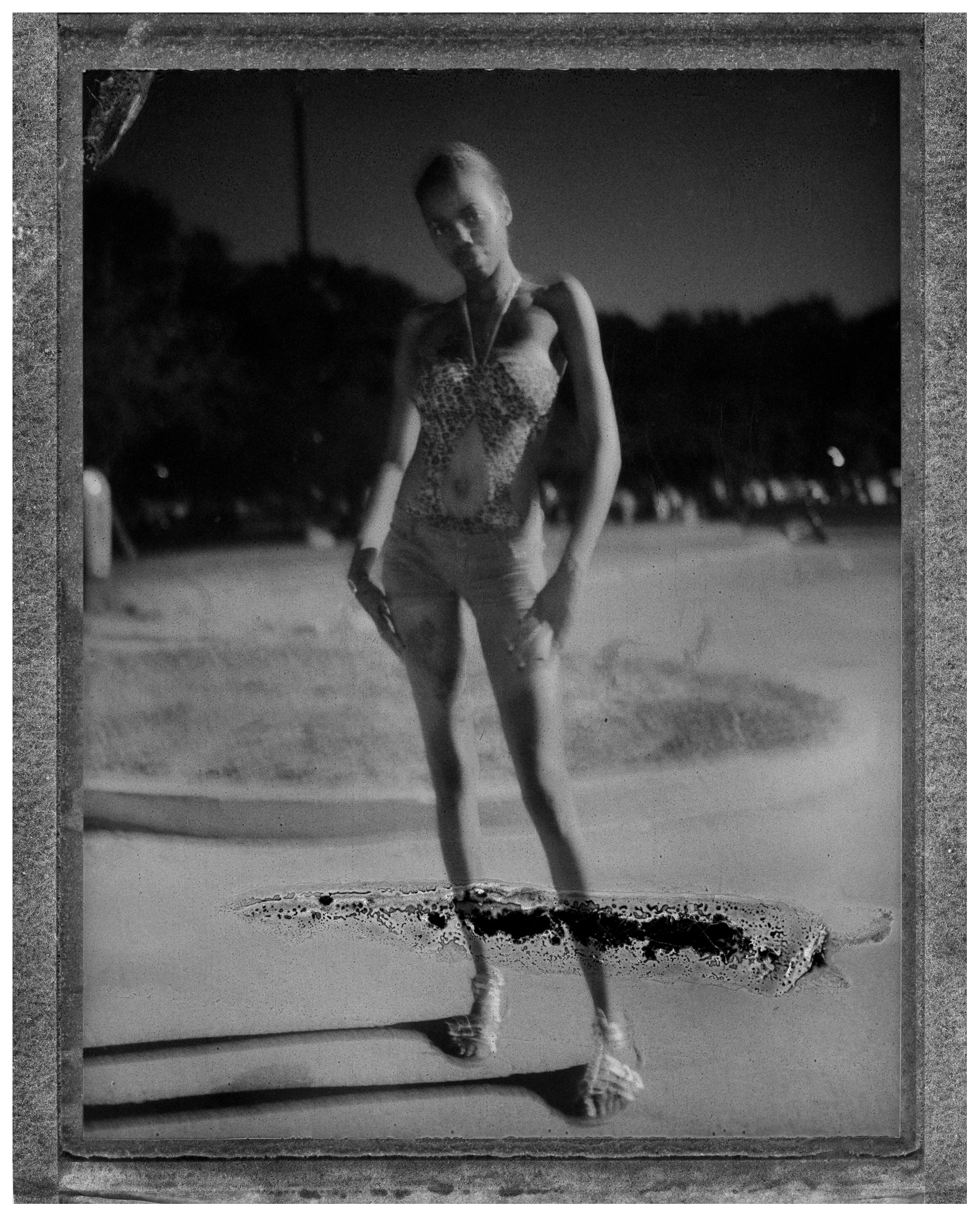  A young woman poses for her picture at Rainbow Beach shortly after the fireworks ended on July 4th. Chicago's South Side 