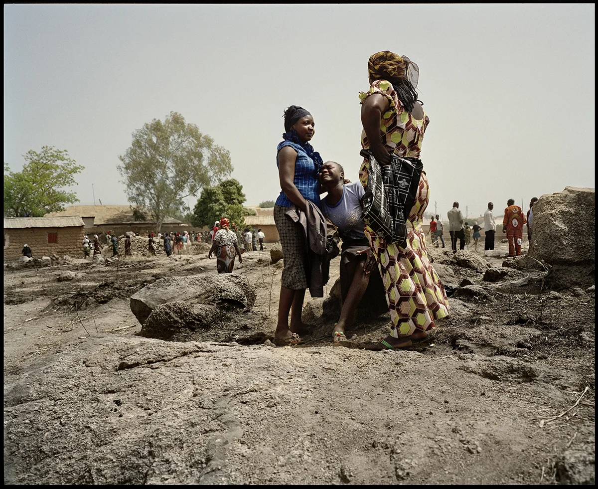 Nigeria, Jos South, March 2012, Berom girls cry at the funeral of Sunday Pam. Sunday, 27yo, has been killed in the suicide attack targeting the catholic Church Saint Finbar, in Rayfield, Jos South. Boko Haram claim to be the perpetrators of the suicide attack.