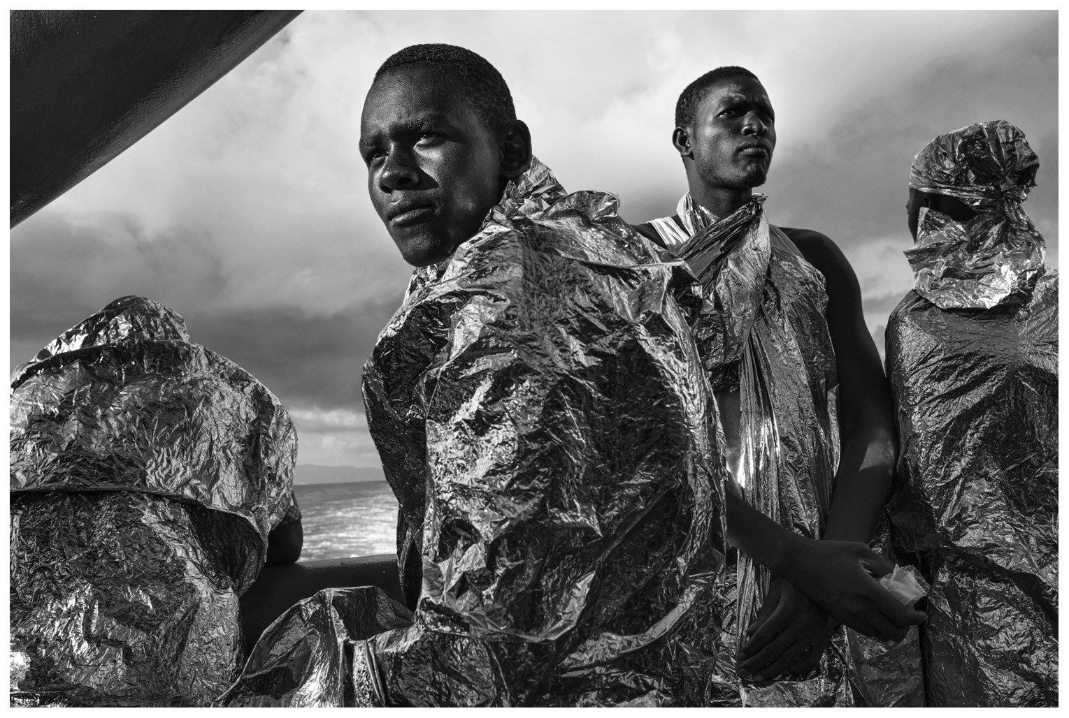  After spending two days and two nights on the MSF Bourbon Argos, rescued migrants catch sight of the Italian coast for the first time. 23 August 2015 