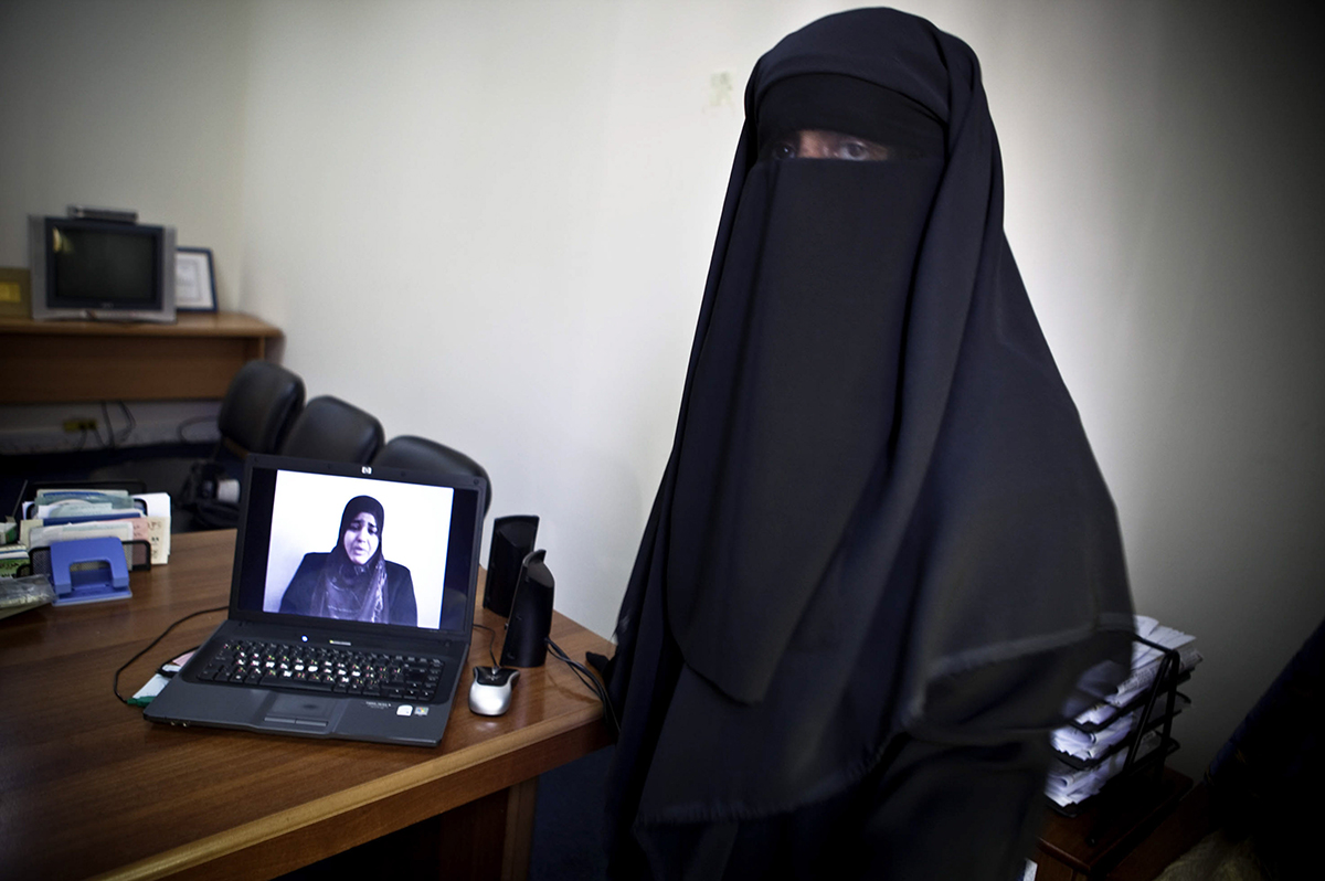   Occupied Palestinian Territories, Gaza City,&nbsp;October 2009, Deema Aydieh, a journalist, prepares to leave her office for a video shoot.  