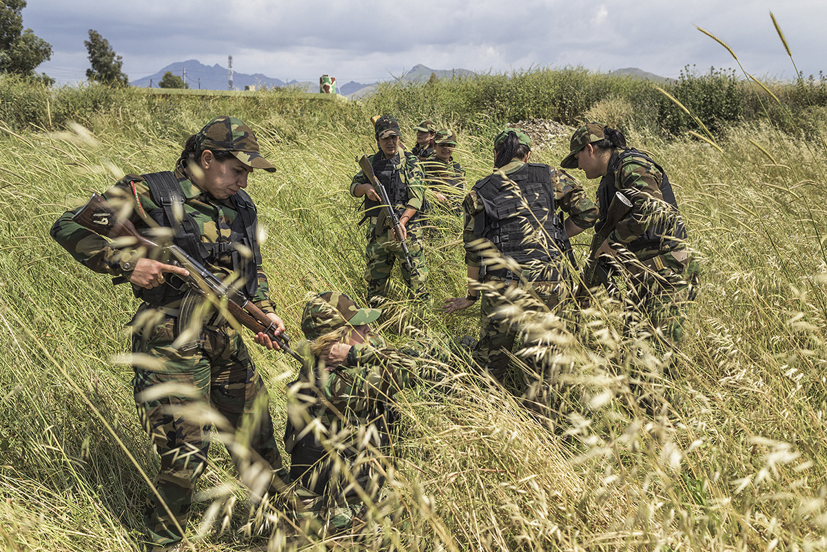 Iraqi Kurdistan, Sulaymaniyah, May 2015, Female Peshmerga belonging to the PUK train at a base outside Slemani. Many of them join the force seeking safety from abusive family relationships; others join to defend Kurdistan from ISIS.