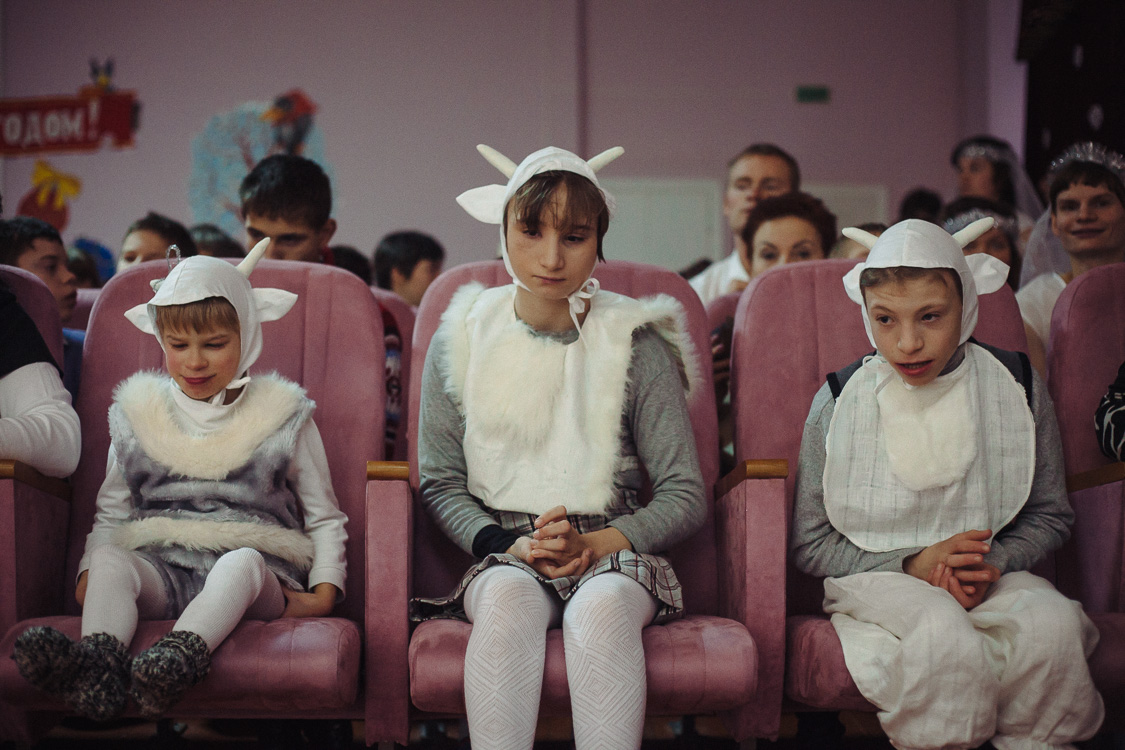  Children participate in the New Year's performance in Cherven orphanage for disabled children and young people with disabilities with psychophysical development. December 23, 2016, Cherven, Minsk region, Belarus. 

In Belarus, orphanages are closed 