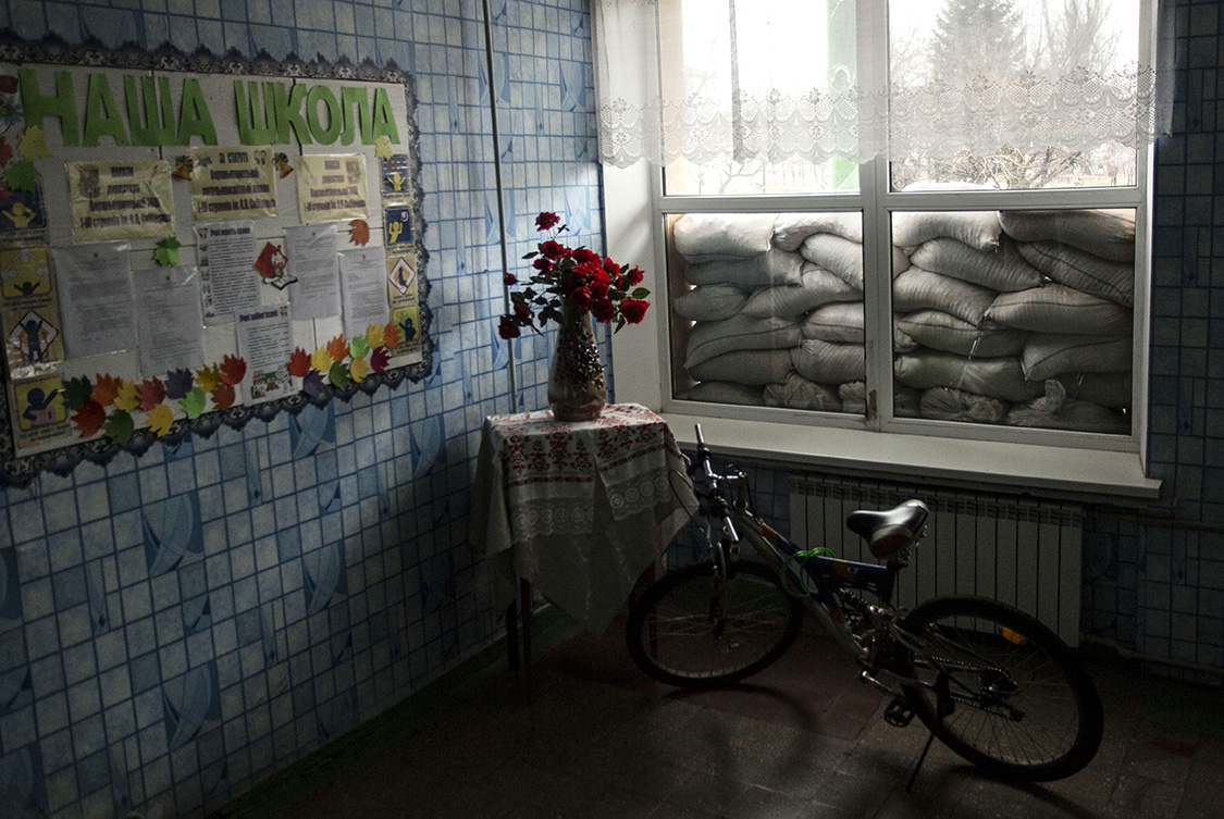  A view of a school window blocked with sandbags in case of shelling in Verkhnyotoretske, Donetsk area, Ukraine. 