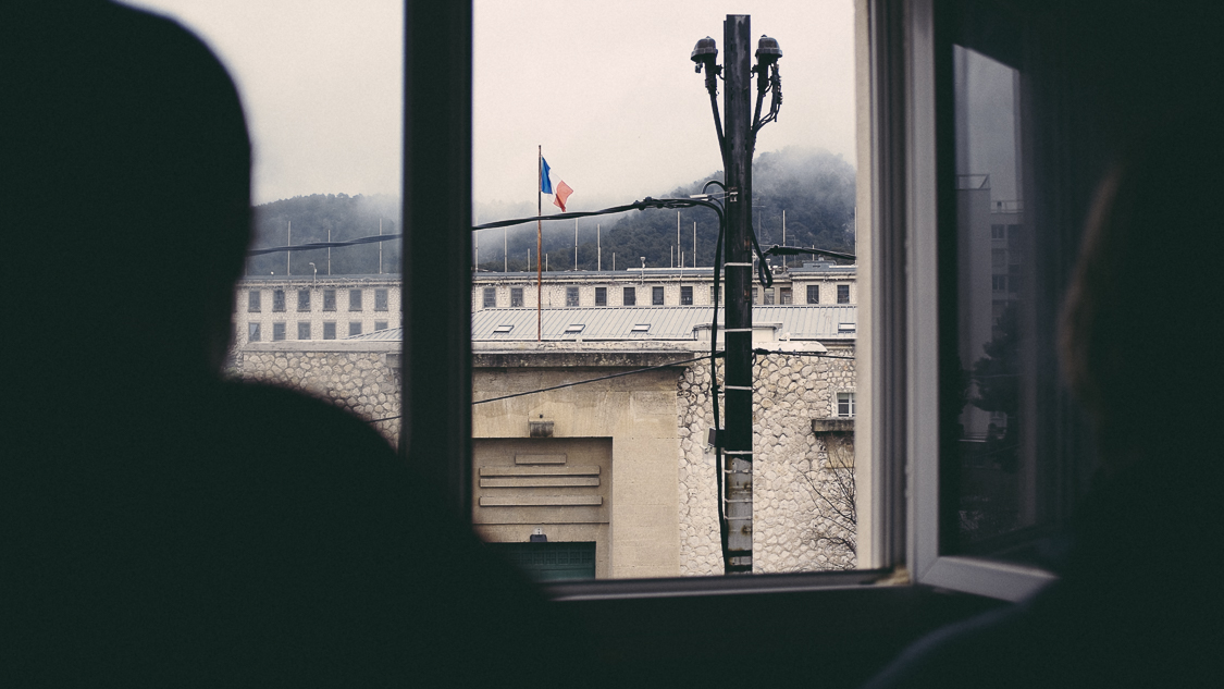  France, Marseille, 25 March 2015.

Exterior view of the Baumettes prison in Marseille (FR), since the windows of the guest house for prison staff. The population incarcerated at Baumettes is, at the time of our visit, 1800 people.

Francesca Todde /