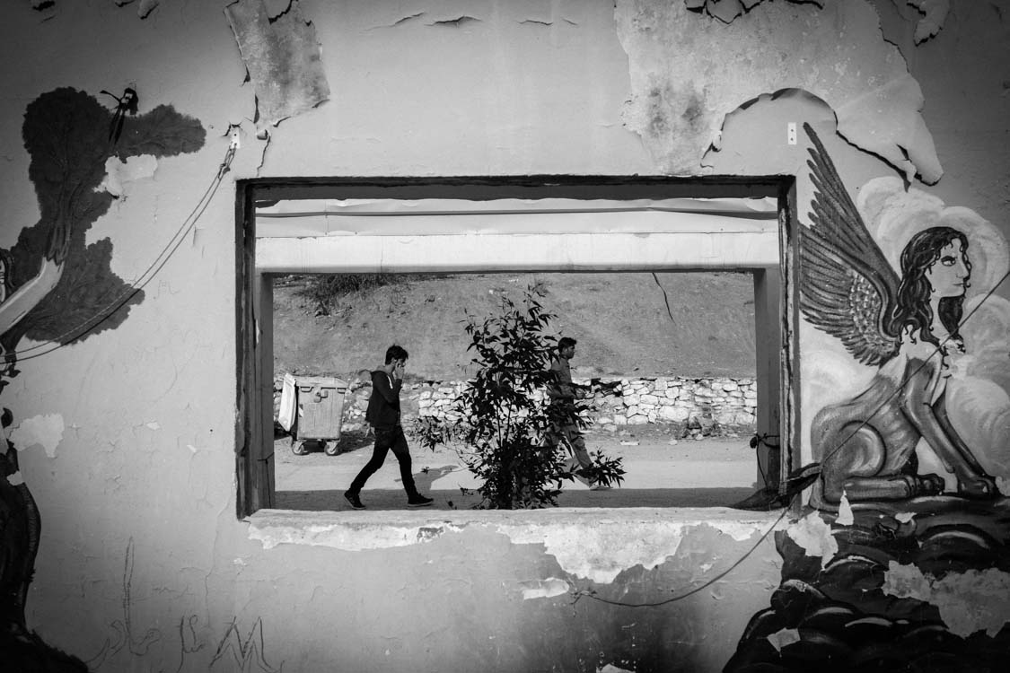  An everyday scene in Moria refugee camp for non-Syrian refugees. Taken in a decaying old building in the camp. 