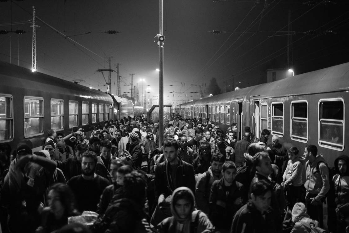  Refugees arrive via a night train that transported them into Austria in the early hours of the morning. Hegeyeshalom crossing, Austria. 