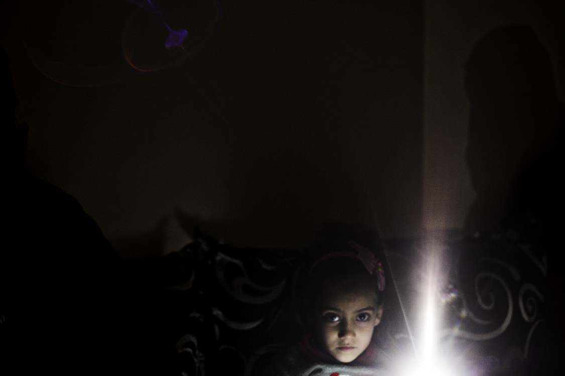  Sarah, a six-year-old Syrian refugee in Turkey. When I met Sarah in the Çankaya area of Izmir, the entire street was dark because of electricity failure. Sarah and her sister, Fatima, lit the room with mobile phones while telling their story. After 
