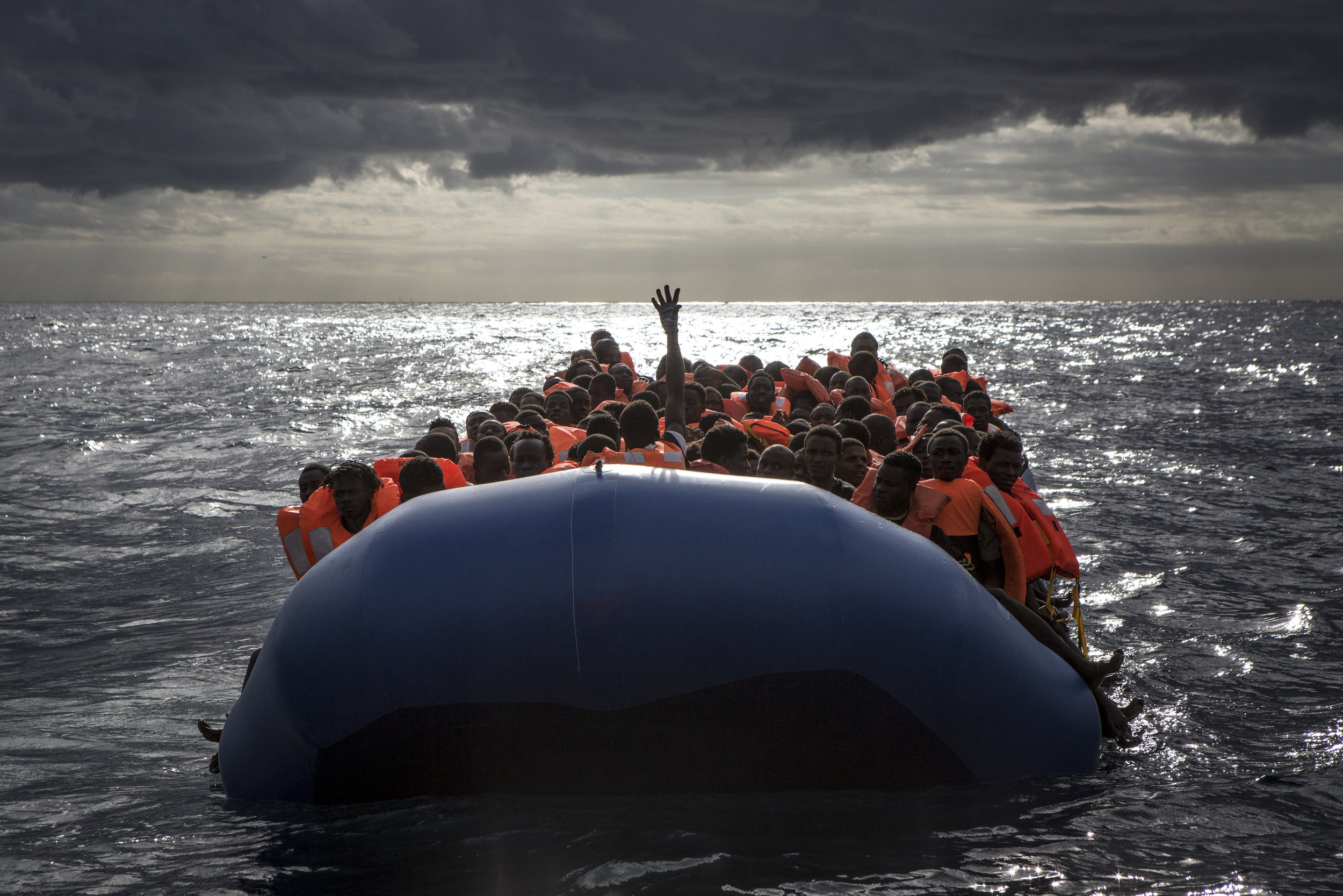  Rubber boat full of migrants after life jackets were distributed by the MOAS crew 