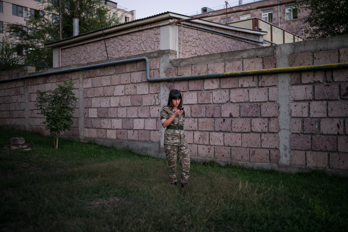  Girl in her uniform in the backyard of their dormitories, Yerevan. 