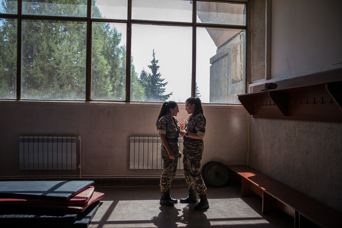  Two girls chatting during free time, Yerevan Military University. 