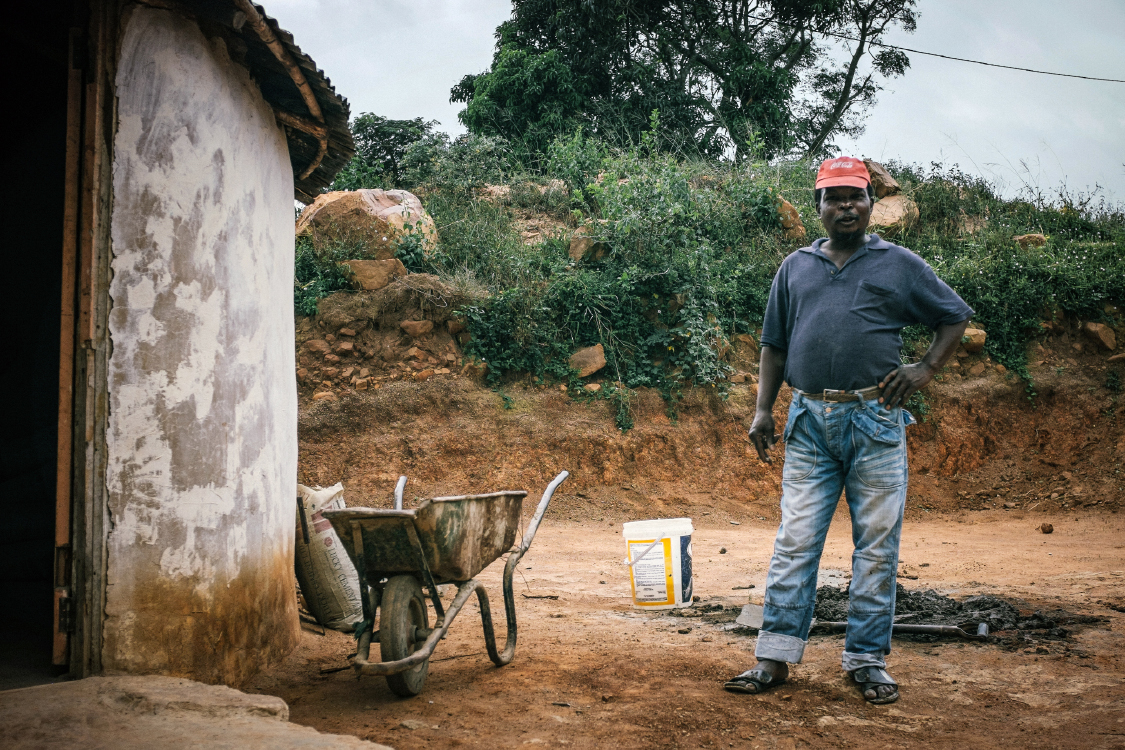  Because the settlement is partly governed by a traditional council headed by a chief, new residents can easily access land and build a home without planning or building approvals. 