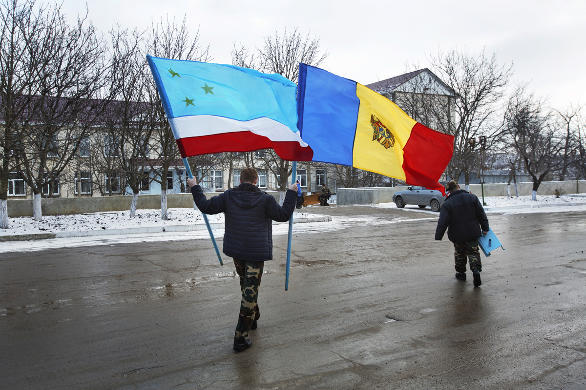  Beshalma, Gagauzia. Moldova - Februrary 2018

Flags of Gagauzia and Moldova are returned to their place at the end of the commemoration day on the memory of those soldiers whos lost their lives during the Afghan war.  