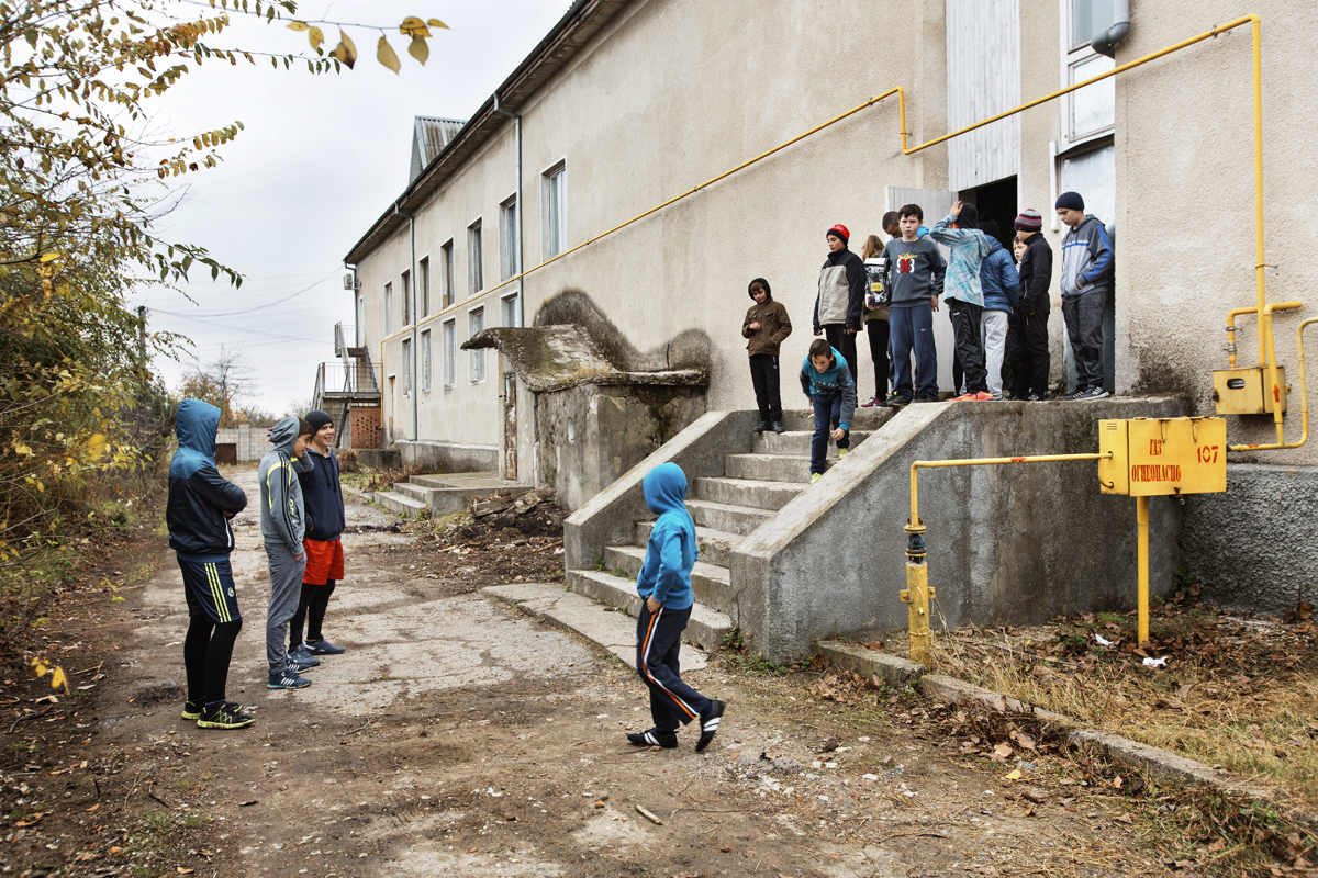  Moldova. Comrat, Gagauzia - November 2017

Students of the Boarding Sports School outside of the boxing gymnasium in the first outskirts of Comrat. They train every day and twice a day, one in the morning and one after afternoon classes. 