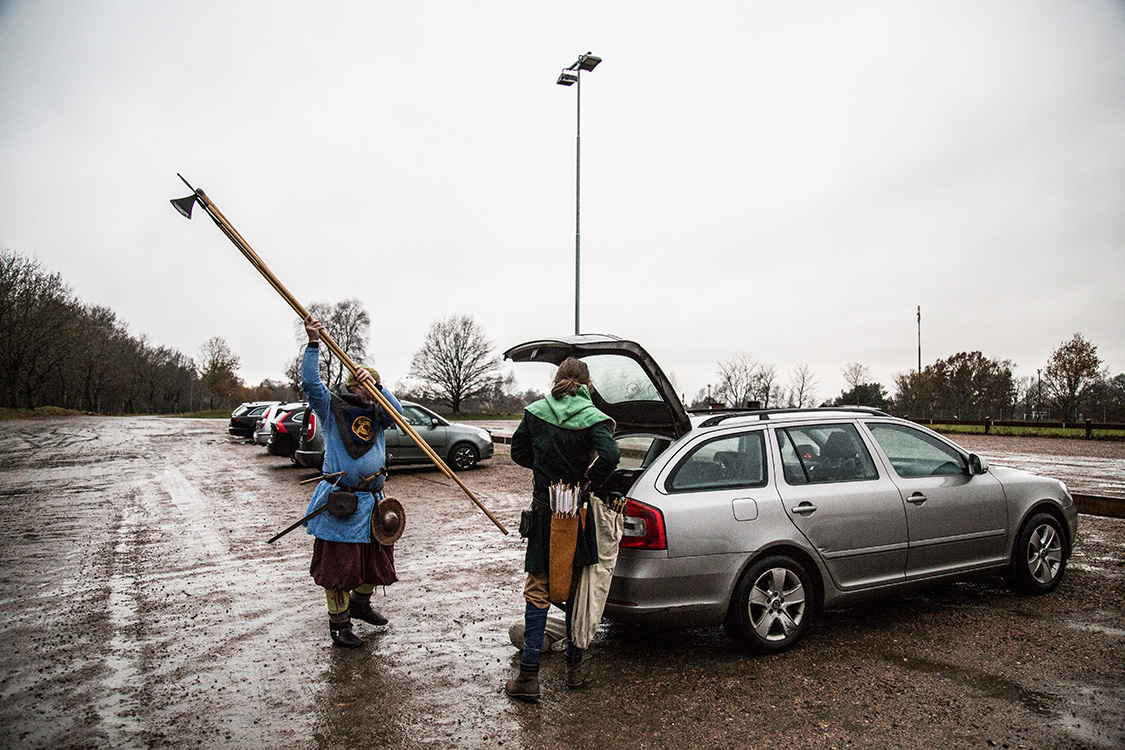  Ola and his son, both Viking reenactors, take their fighting gear out of their car, before a training session near Malmo, Southern Sweden. 