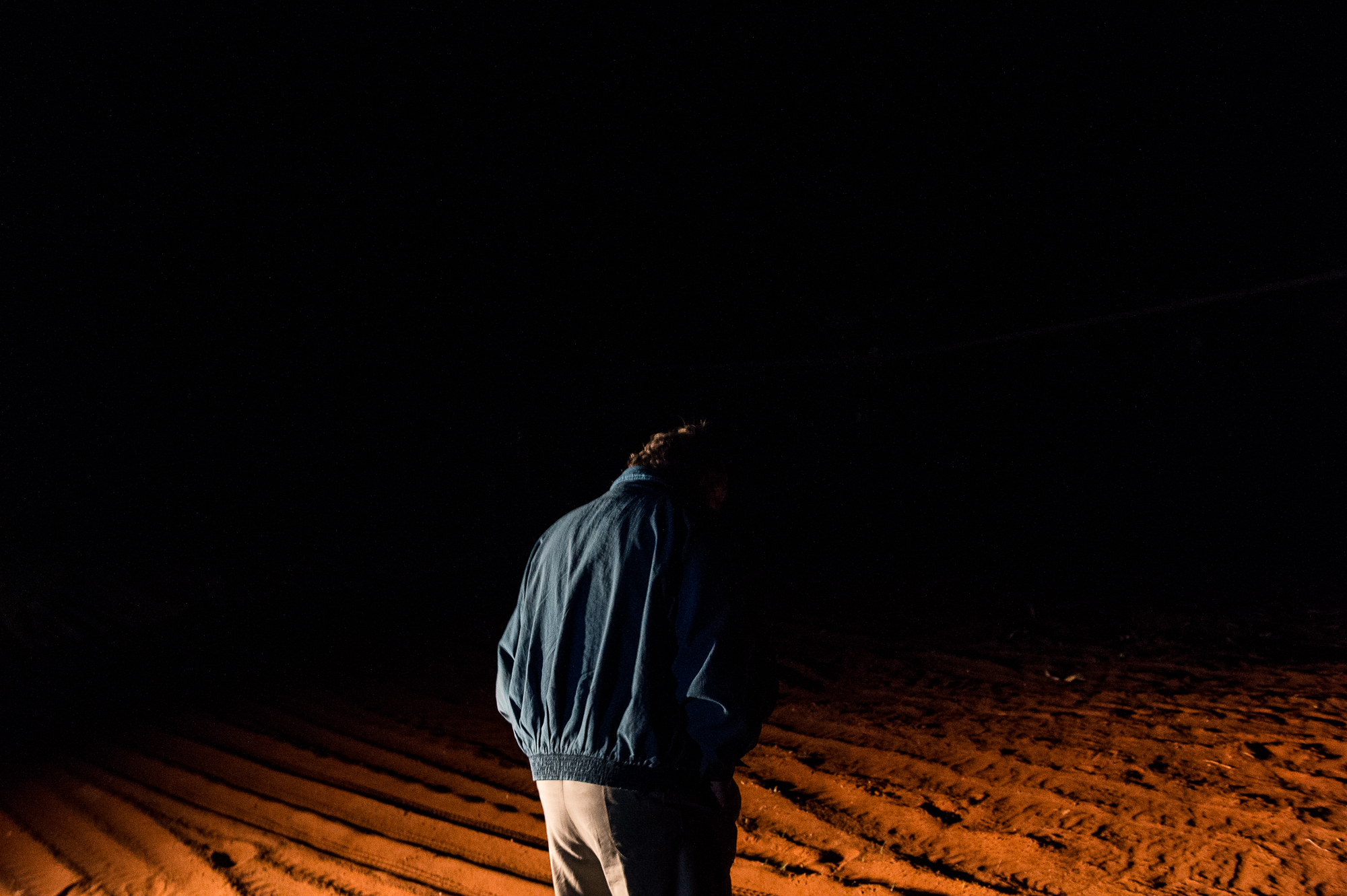  South Africa, Northern Cape, 03.08.2018 // Willem, a farmer in the Karoo Desert, living next to Orania, Northern Cape. At night he is turning on the irrigation for the fields. // Lucas Bäuml 