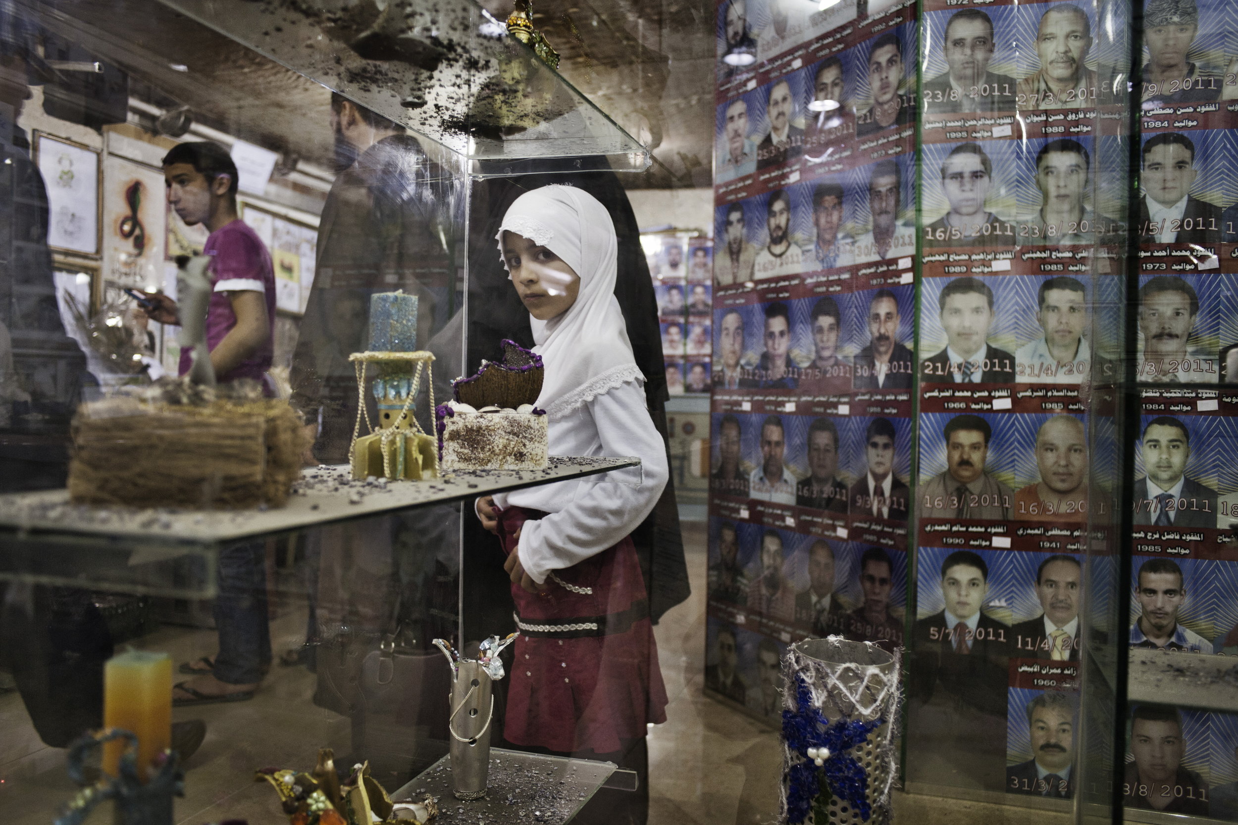  Misrata Libya April  01 2012: A young girl inside the newly-opened museum in Misrata.
The Ali Hassan Jaber Martyr Exhbit is named for an Al-Jazeera cameraman who was killed covering Libya?s revolution, but contains the horrors and tragedies of Misra