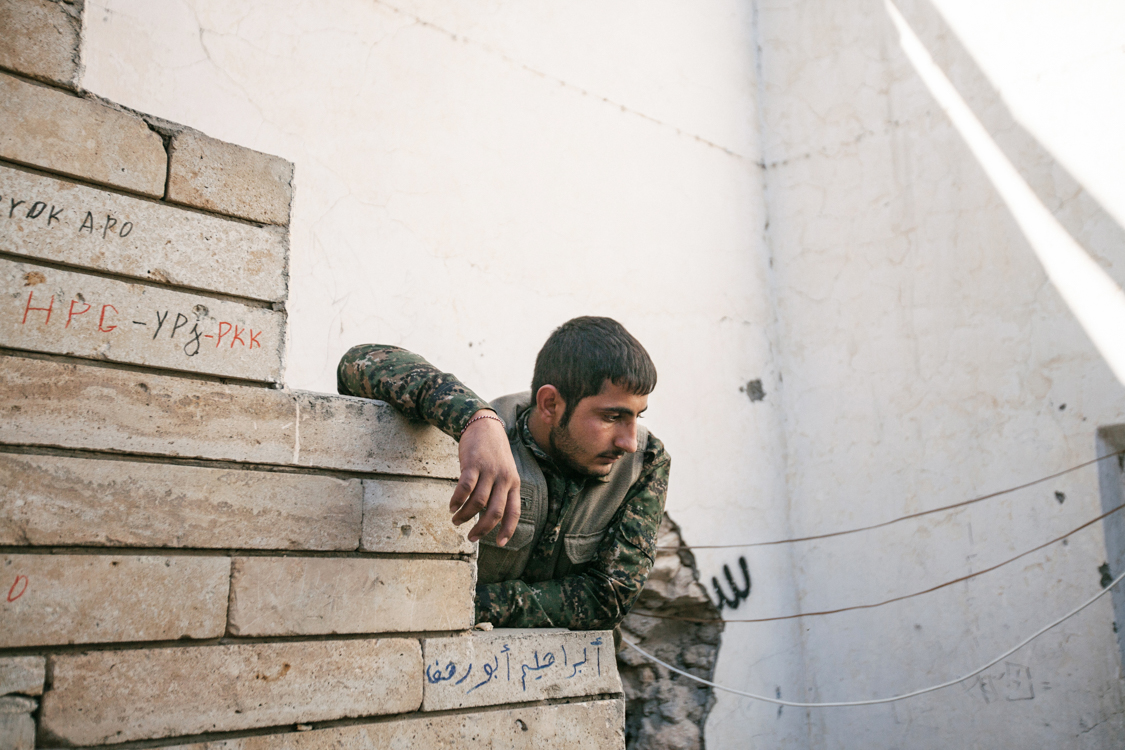  The stare of a YBS fighter seems lost towards death. Sinjar, Iraq, November 2015. 
