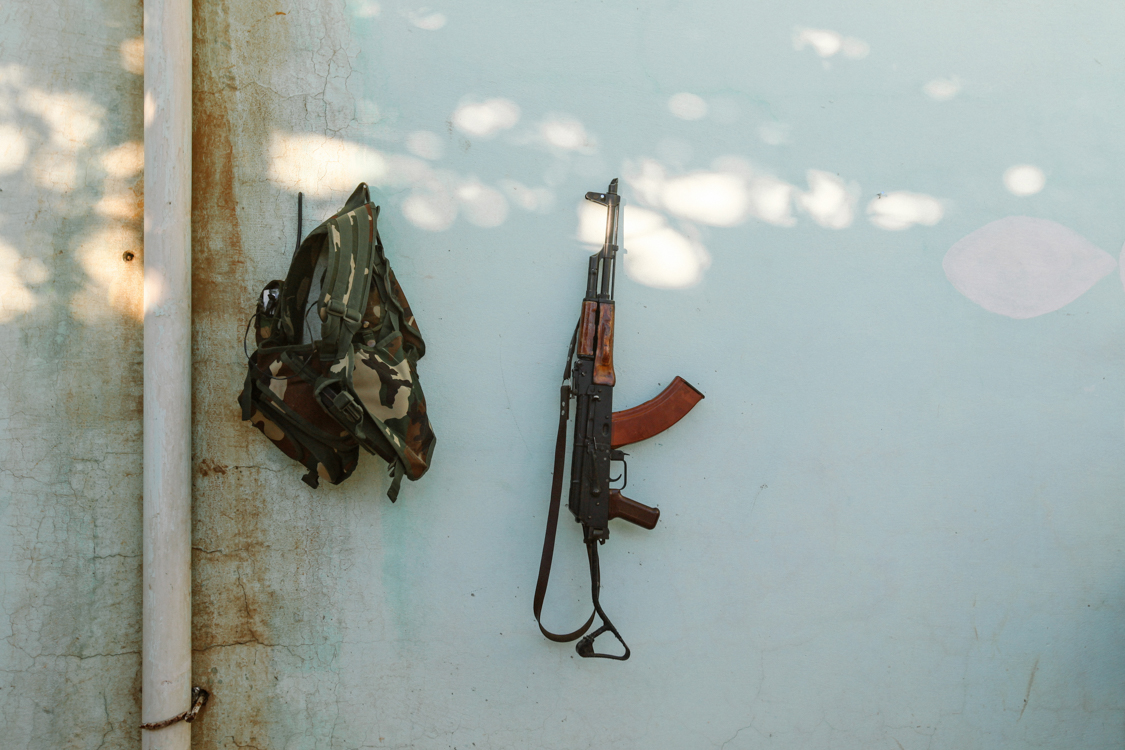  Equipment of a young soldier: bag and rifle. Sinjar, Iraq, November 2015. 