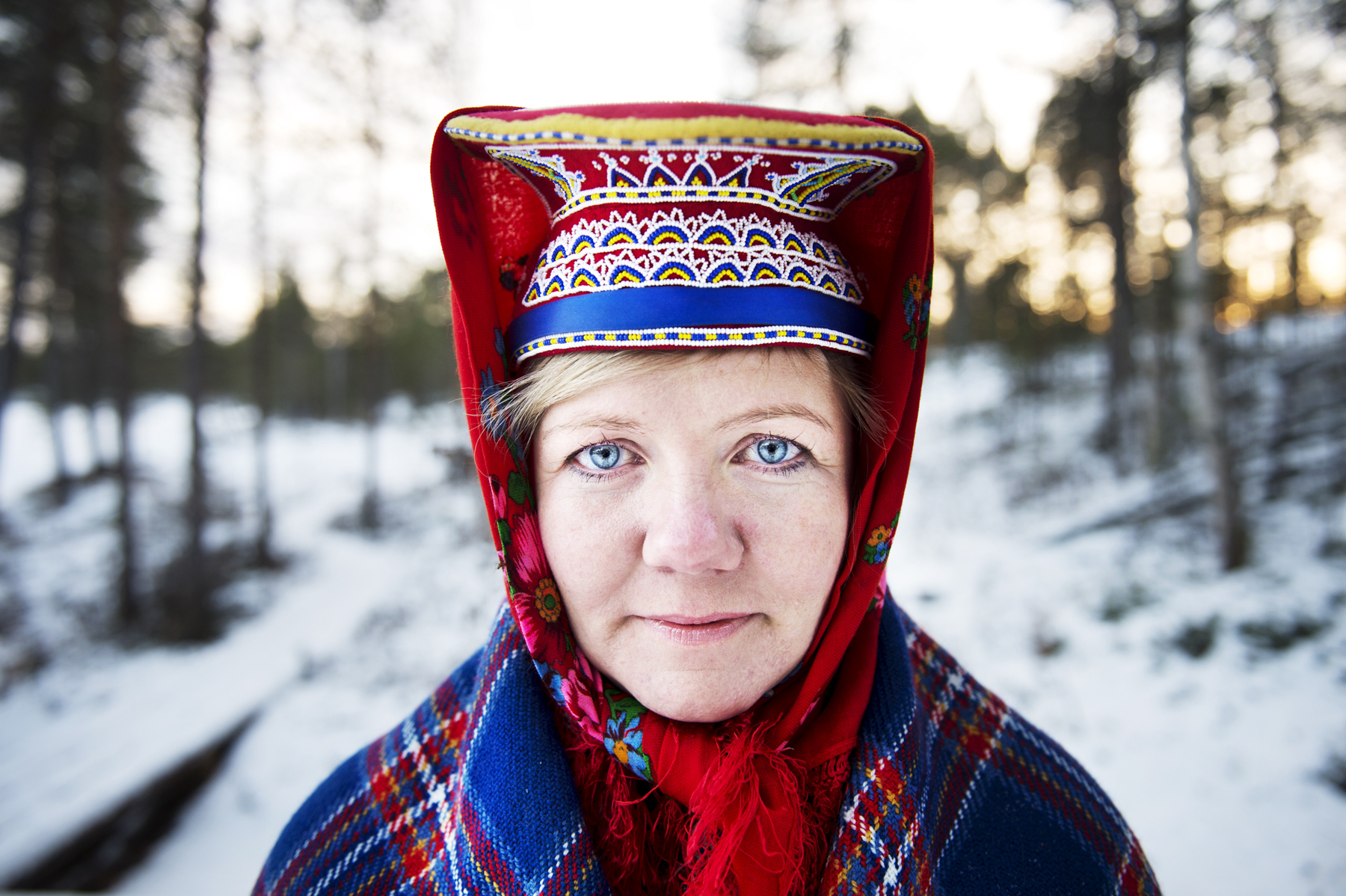 Finland, Lapland, 17 November 2013
Jouko Lappalainen and his wife Mari own the Aurora Bubbles. Here portrayed is Mari, dressed in traditional Sami clothing.
Samne De Wilde / NOOR