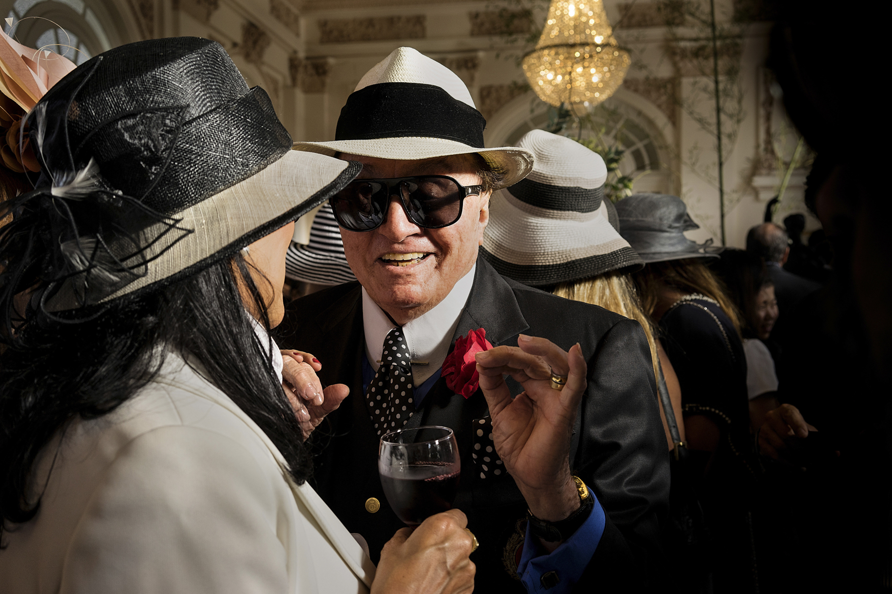  JUNE 2014, RIO DE JANEIRO, BRAZIL: Members of the Rio�s elite talking at the VIP area oft the Gavea Golf Country Club during the Annual Jockey National Award. It�s  the meeting point for the rich people of Rio de Janeiro, whether for a round of golf