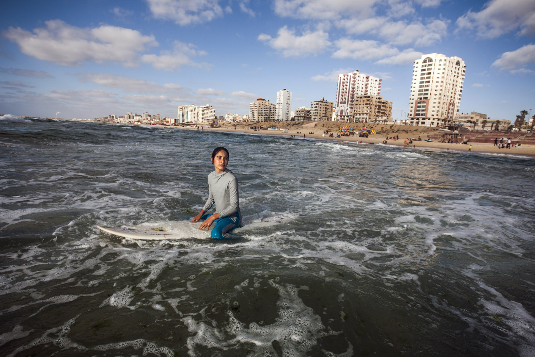  Occupied Palestinian Territories, Gaza, Gaza City, 26 May 2013

Sabah Abu Ghanem, 14, waits for a wave on a slow surf day. 