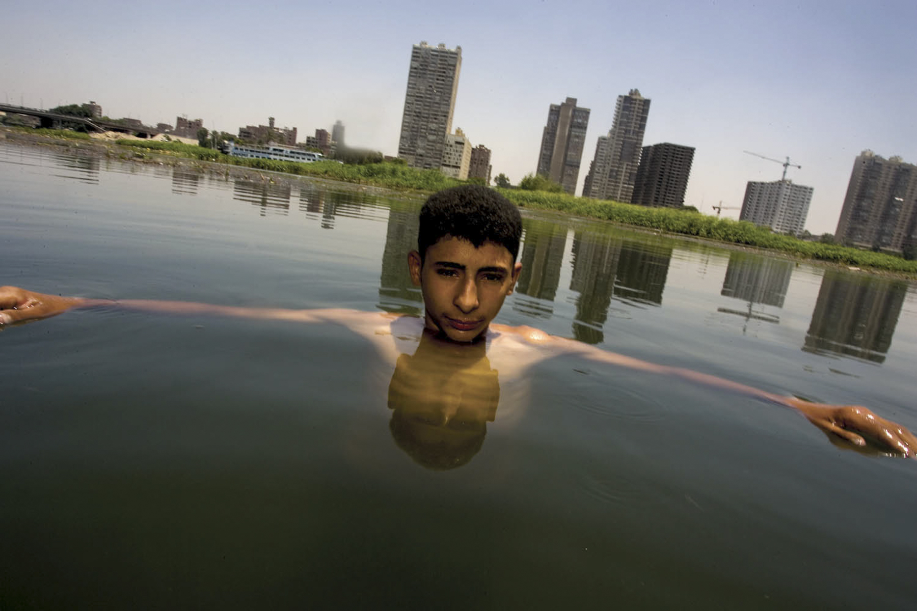  "Dahab Island" a small community living
on a tiny island in middle of Nile, right in
thriving Cairo. 