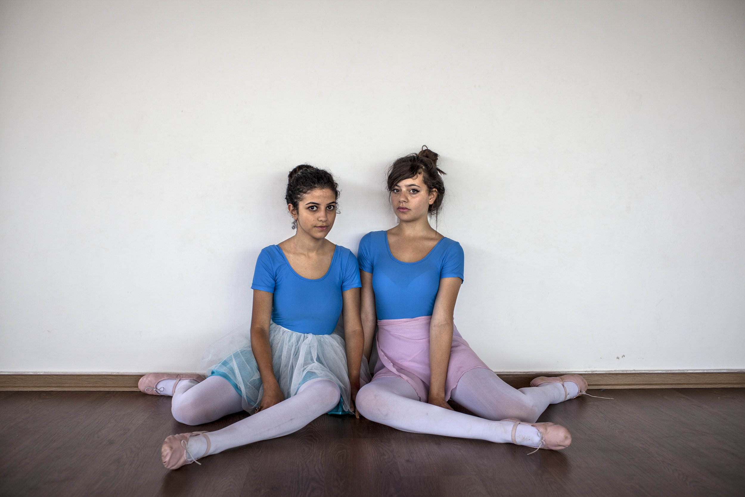  Tanya Habjouqa/NOOR Ramallah

Two Ramallah high schoolers with big dreams take ballet together.  