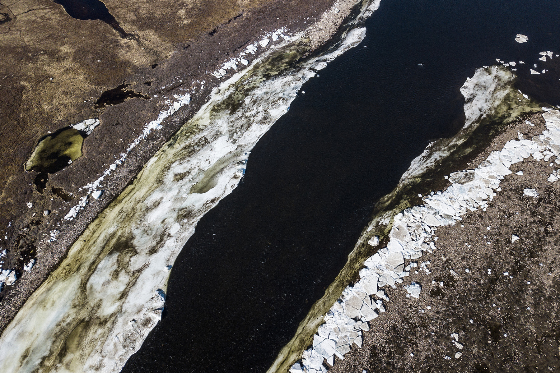  Canada, Nunavut, Kangiqsualuk Ilua (Hudson Bay), June 2018

Ice remains at a river mouth close to Rankin Inlet at the Hudson Bay.
The Canadian Arctic is immense and remote. There are no deep sea ports, hardly any roads and Canada has too few icebrea