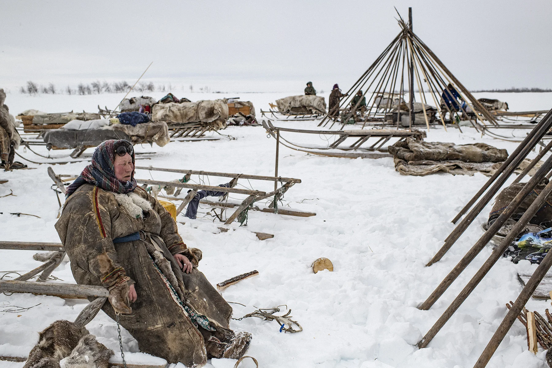 Russia, Yamal Peninsula, April 2018
The Yamal peninsula in western Siberia, a homeland of nomadic Nenets reindeer herders.
The Nenets people of the Siberian arctic are the guardians of a style of reindeer herding that is the last of its kind. Through a yearly migration of over a thousand kilometres, these people move gigantic herds of reindeer from summer pastures in the north to winter pastures just south of the Arctic Circle. No-one knows for certain whether it is the reindeer that lead the people or vice versa. What is certain is that fewer places on earth are home to a more challenging environment, an environment where temperatures plummet to -50C and where crossing the worlds fifth largest river as it deep-freezes is just part of the routine. Such a difficult environment unites the people physically through a regimented work ethic, but far more importantly, the Yamal-Nenets are unified by a robust and vibrant culture. It is a culture that has had to survive a turbulent history, from early Russian colonisation, to Stalin’s terror regime, to the modern day dangers of a rapacious oil and gas development programme.
Yuri Kozyrev / NOOR for Carmignac Foundation
