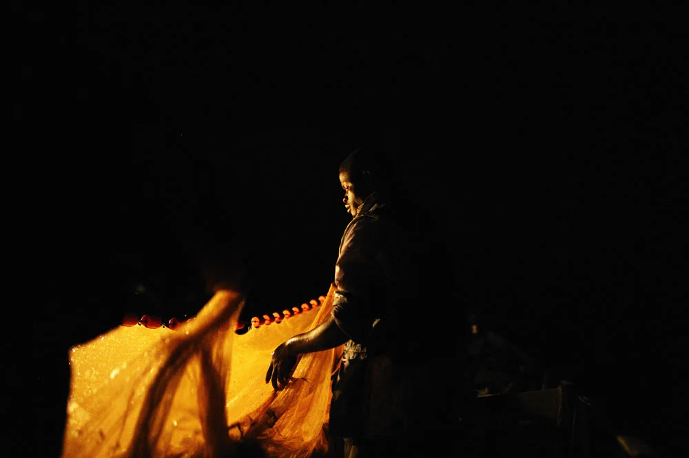 stanley Greene (C) NOORIMAGES-2010
Kuvua Samaki Mwangazani
Hunting the fish into light
"Pulling the net "
Nyachebe Solar Fishermen -Mbita ,Kenya
Fishing on Lake Victoria with Solar power in Nyachebe Beach CommunityMbita is a town close to Lake Victory. There is a big solar installation where fishermen Use solar light to attract fish at night in the lake instead of Kerosene lamps.