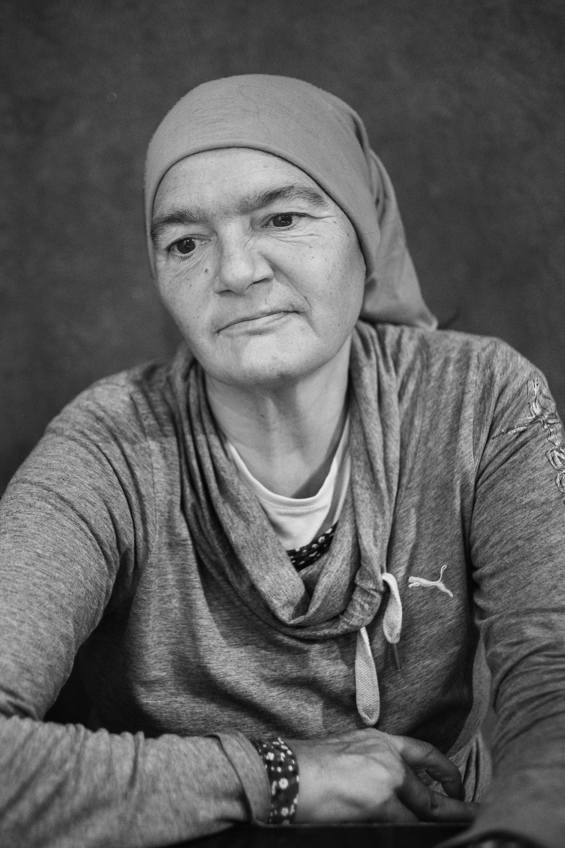  Tiziana Sfreddo (59) portrayed in the district of San Salvario in Turin, Italy; November 2018.
Ms. Sfreddo lived 4 years in an occupied abandoned factory; at the beginning of her life on the streets, she stayed 3 months without a proper shower, befo