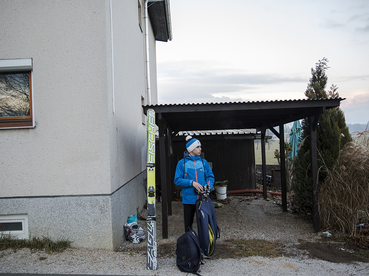  Nikola waiting for the bus in front of his new home in Slovenia, February 2019. 
Photo/ Vladimir Zivojinovic 