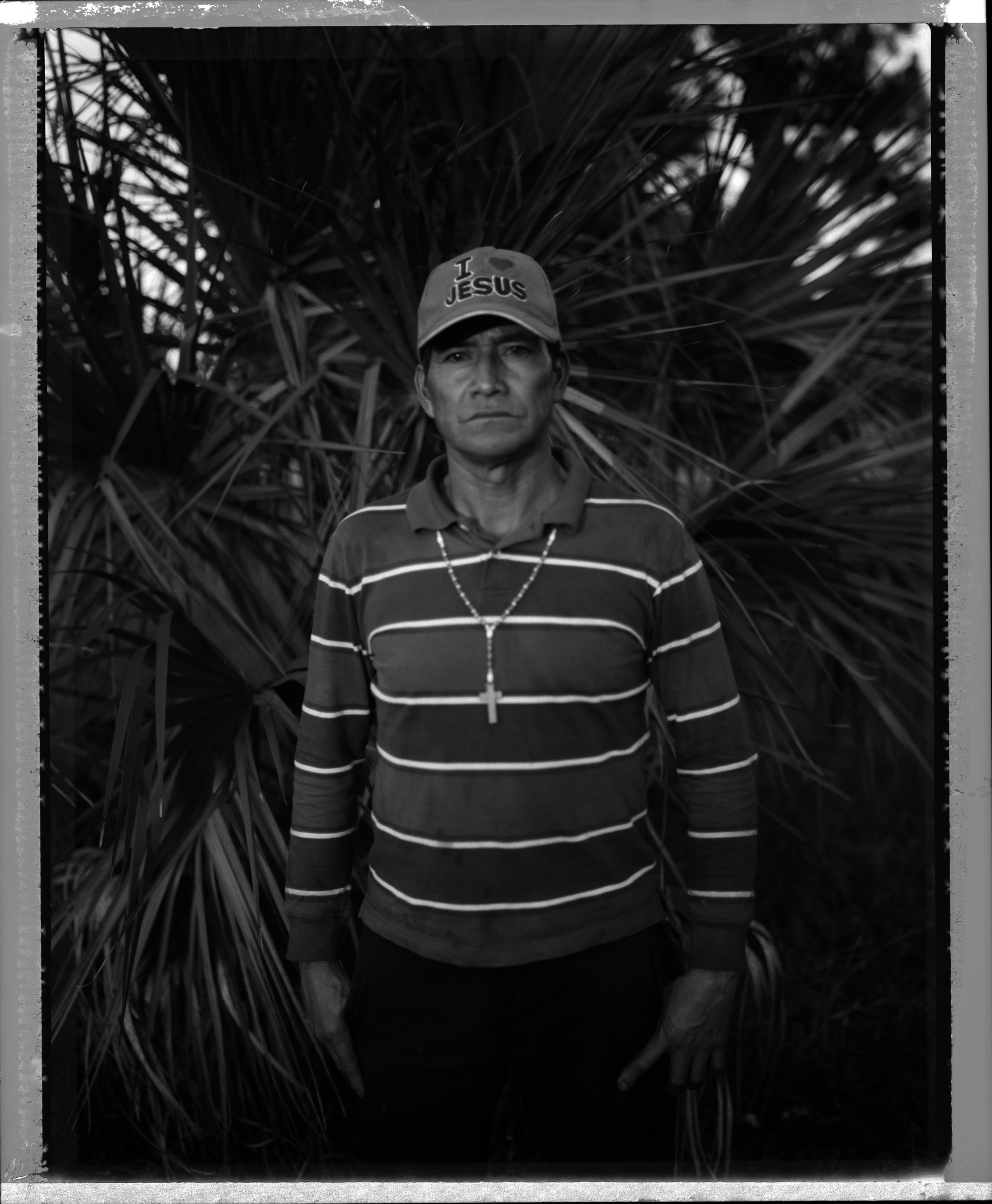 Photographs of victims of forced labor in the United States. Photographs of victims of forced labor in the United States.
For more than a year Geronimo Sanchez Bravo was forced to work and live as a slave in downtown Immokalee for about a year. During that time he was forced to live in a large truck in the front yard of a normal looking house and pick tomatoes for his captors. . Eventually, several workers made a hole in the top of the truck and were able to escape and get help. They went directly to the Coalition of Immokalee Workers who helped Geronimo and the others to escape. Geronimo testified against his captors. He still lives in Immokalee and is happy that he's free. He now is an active member of the anti-slavery movement and works hard for the rights of his fellow workers. He still picks tomatoes.
This project is supported by Lexis Nexis