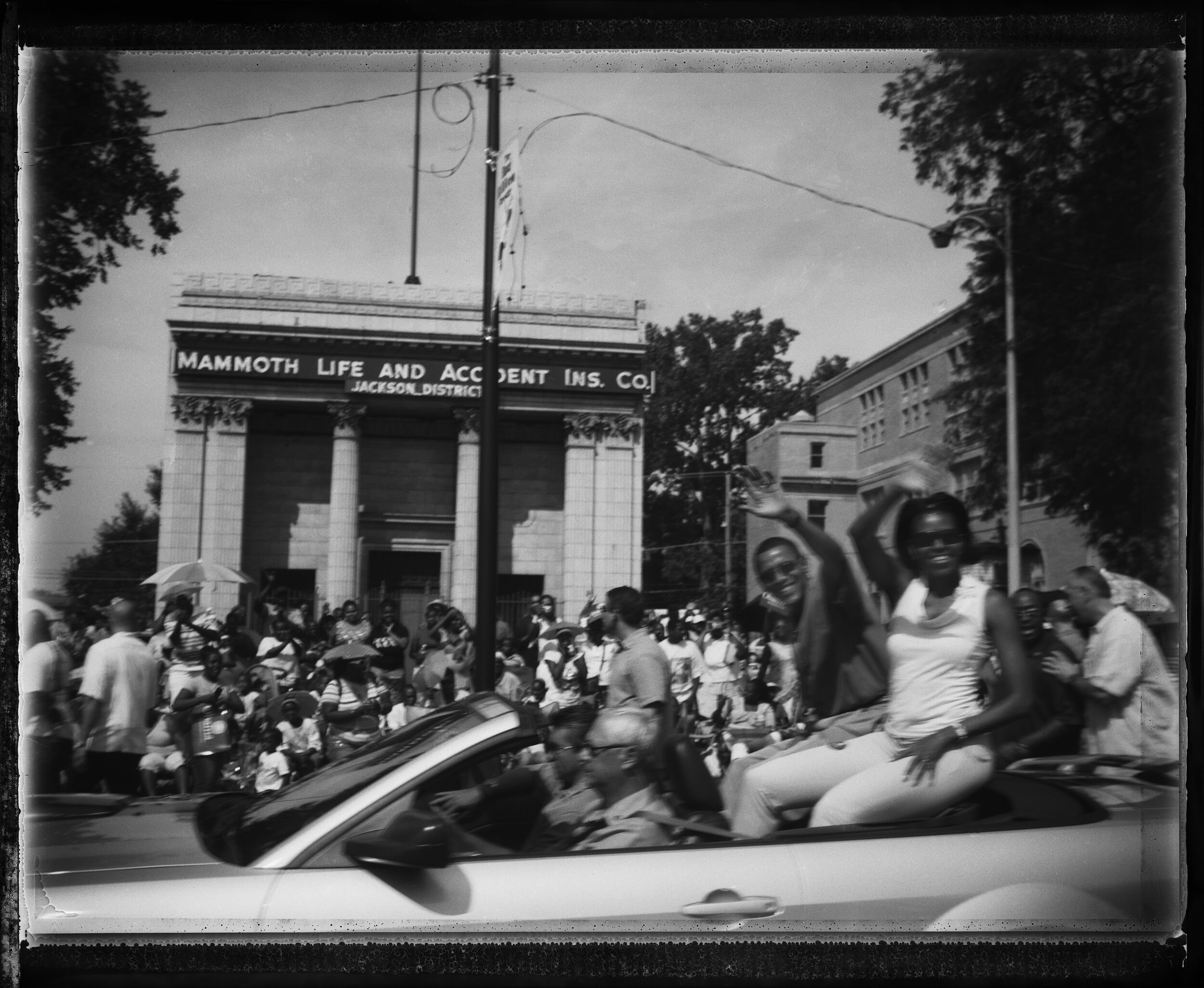  Barack Obama and his wife Michelle greet throngs of supporters at the 79th Annual Bud Billiken Parade on Chicago's South Side. 