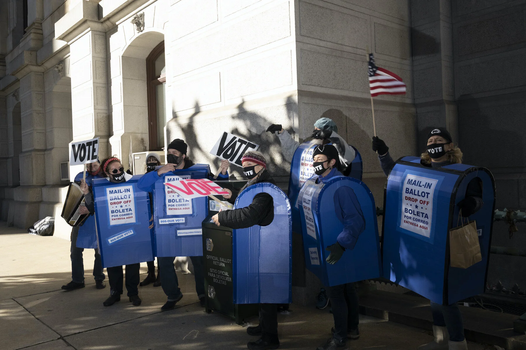  USA, Philadelphia 2 November, 2020,  "Delivering Democracy" a street theater performance featuring dancing and singing ballot drop boxes gathers around the dropbox at Philadelphia City Hall to promote voting and to share voting rights information.  