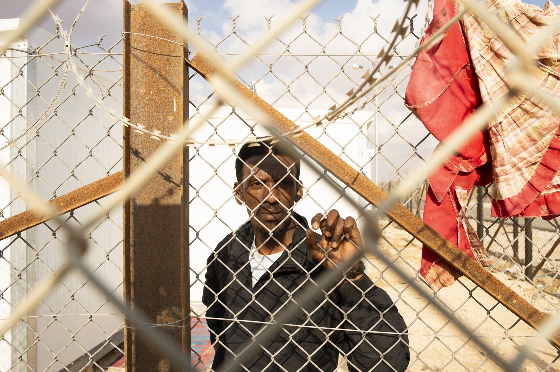  This man had been waiting more than a week to enter the camp with his wife and children but was being held up in a bureaucratic limbo as his wife was Saudi Arabian. Only Syrians can enter as refugees to Jordan, so this family was sent to a special h