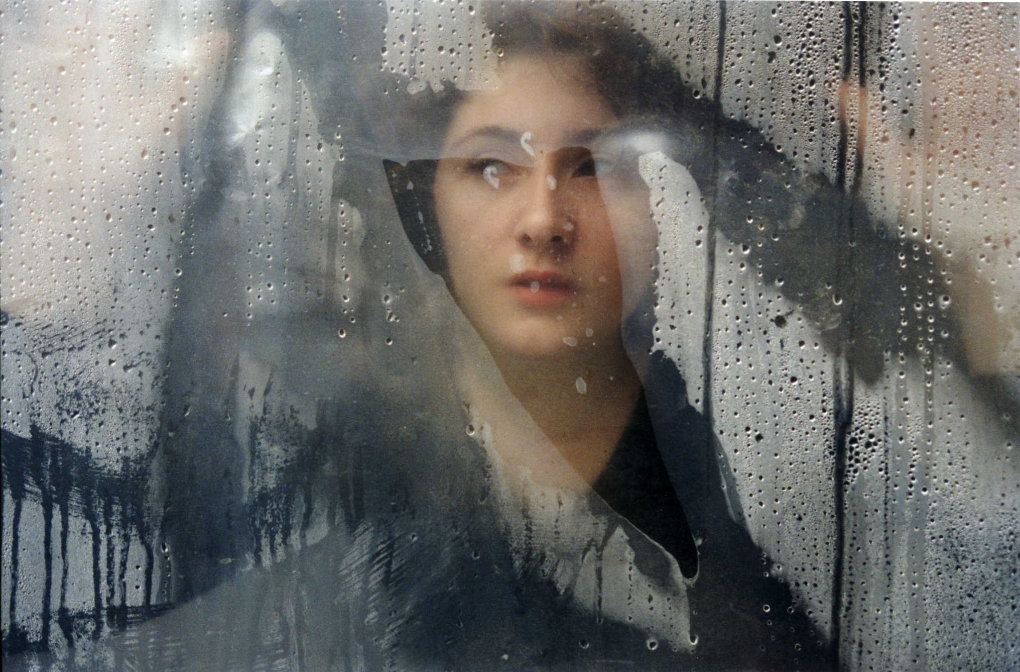  Zelina, after the death of her child. She says she is already dead herself, if only time would hurry up. Downtown Grozny, Chechnya. April 2001.   Photo © Stanley Greene/ NOOR 