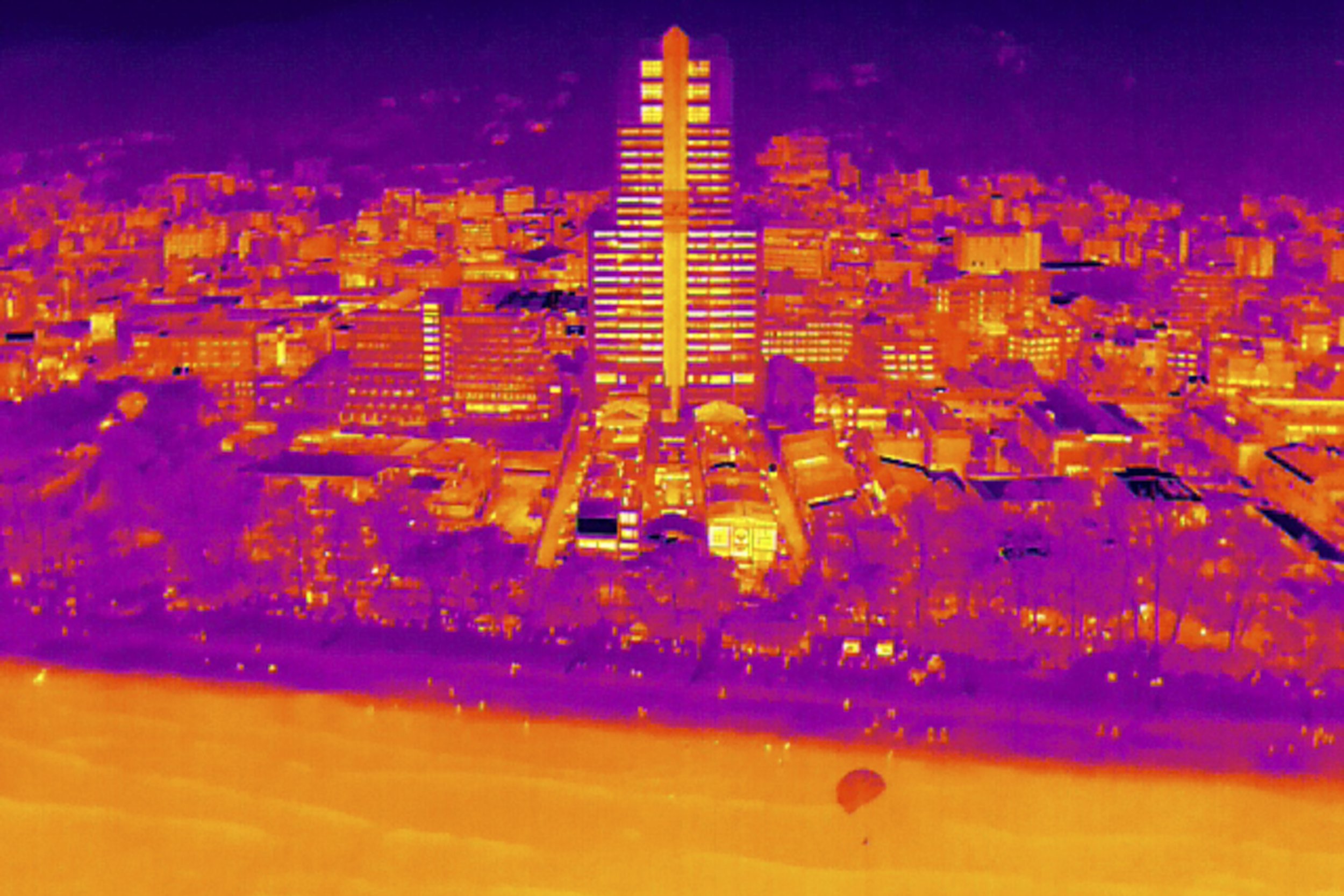  Aerial thermal imaging shows the heat of the city and human activity at Patong Beach, a major seaside tourism destinations of the world, Phuket Thailand. After the industrial revolution, human industries have increasingly release carbon dioxide into