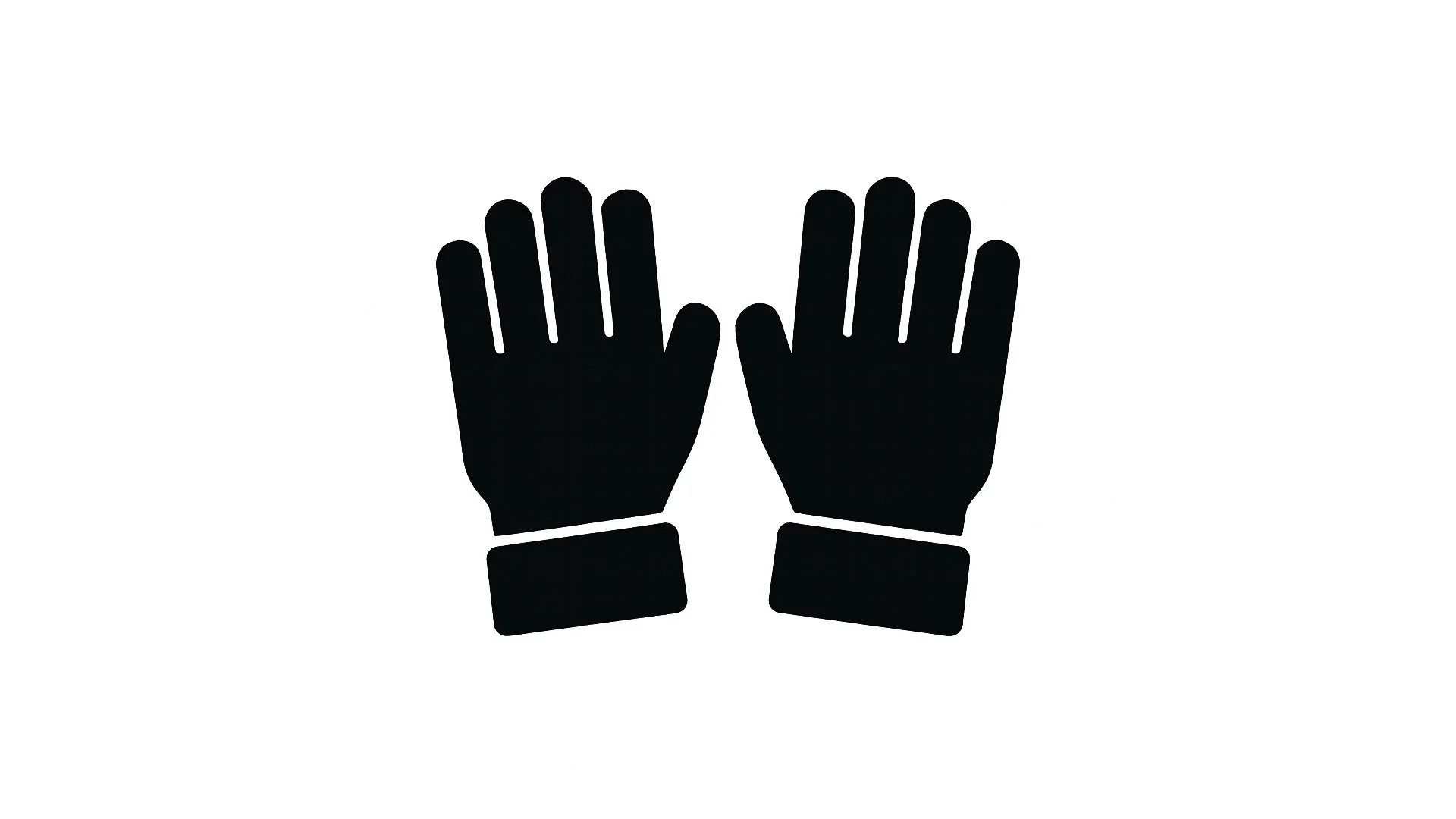 A man with a beard, tattoos, and a mohawk hairstyle in athletic clothing is in a crouched position with his elbows resting on his knees and hands clasped together.