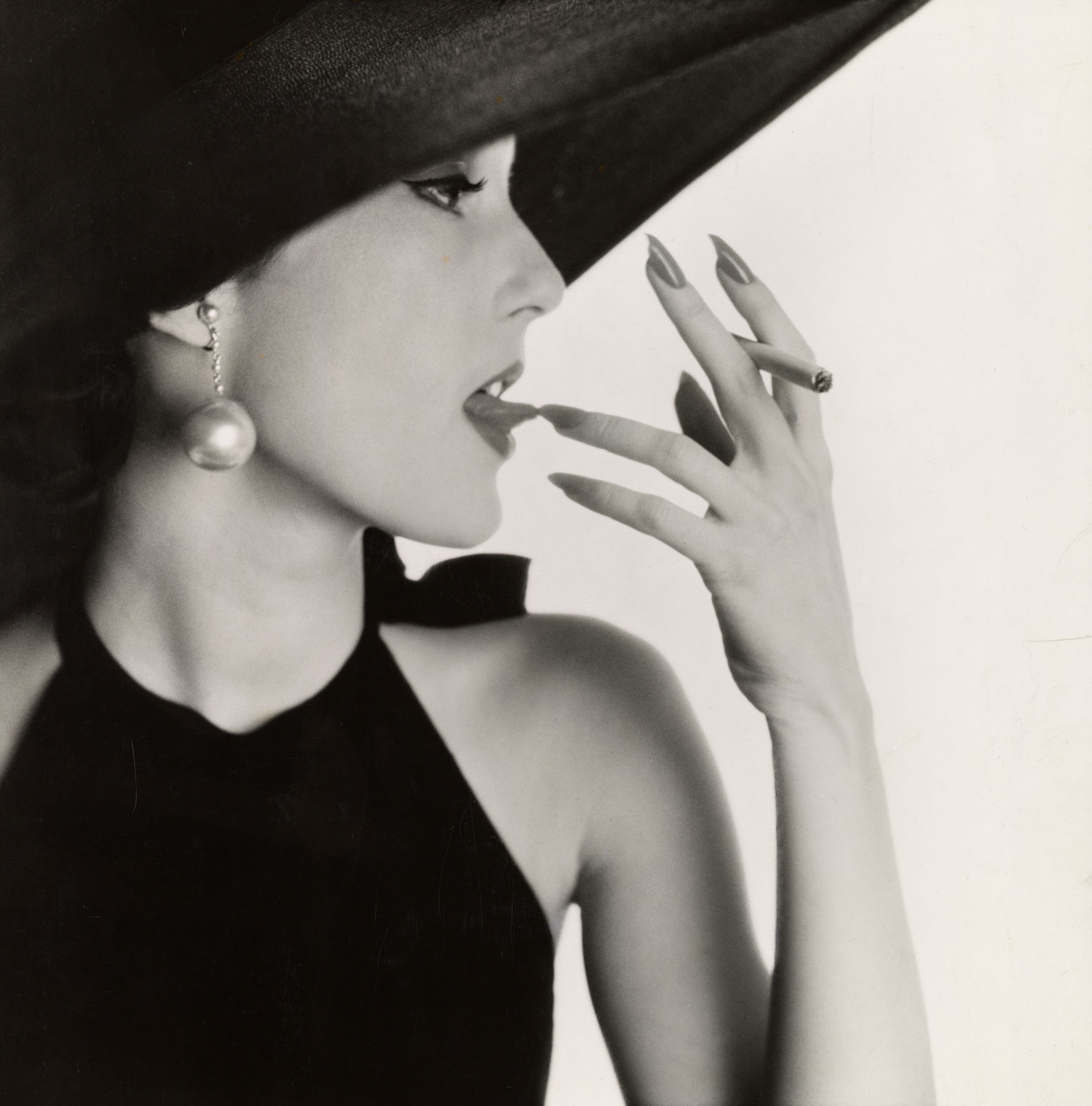 Irving Penn, Girl with Tobacco on Tongue (Mary Jane Russell) , New York, 1951
96
Normal
0
false
false
false
EN-US
X-NONE
X-NONE
/* Style Definitions */
table.MsoNormalTable
{mso-style-name:"Table Normal";
mso-tstyle-rowband-size:0;
mso-tstyle-colband-size:0;
mso-style-noshow:yes;
mso-style-priority:99;
mso-style-parent:"";
mso-padding-alt:0in 5.4pt 0in 5.4pt;
mso-para-margin:0in;
mso-para-margin-bottom:.0001pt;
mso-pagination:widow-orphan;
font-size:12.0pt;
font-family:Calibri;
mso-ascii-font-family:Calibri;
mso-ascii-theme-font:minor-latin;
mso-hansi-font-family:Calibri;
mso-hansi-theme-font:minor-latin;}
© Condé Nast