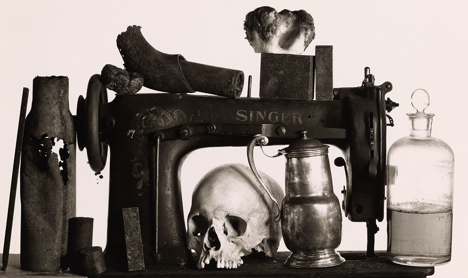 Irving Penn, Sewing Machine with 13 Objects , 1979. Platinum-palladium print. © The Irving Penn Foundation