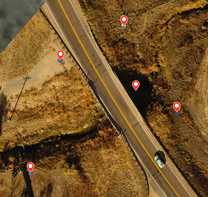 In this example, the center GCP is in a heavily shaded area and nearly invisible in the map photos.