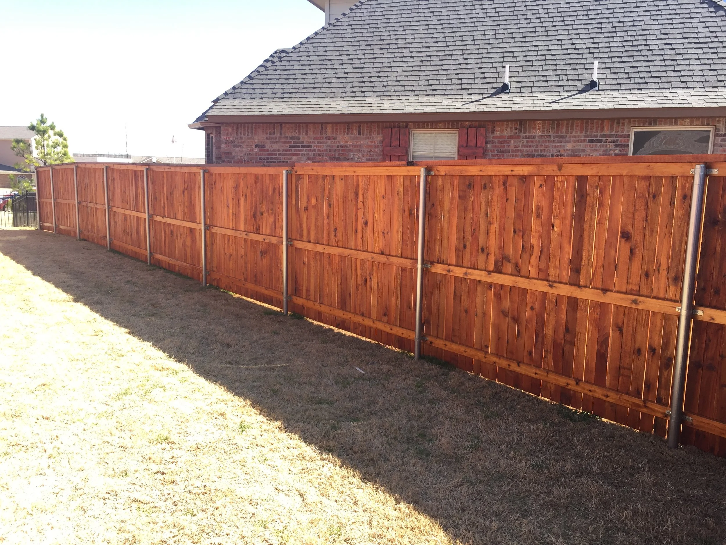 Driven Posts vs Concrete for Fence Posts in Oklahoma: Which Is Better?