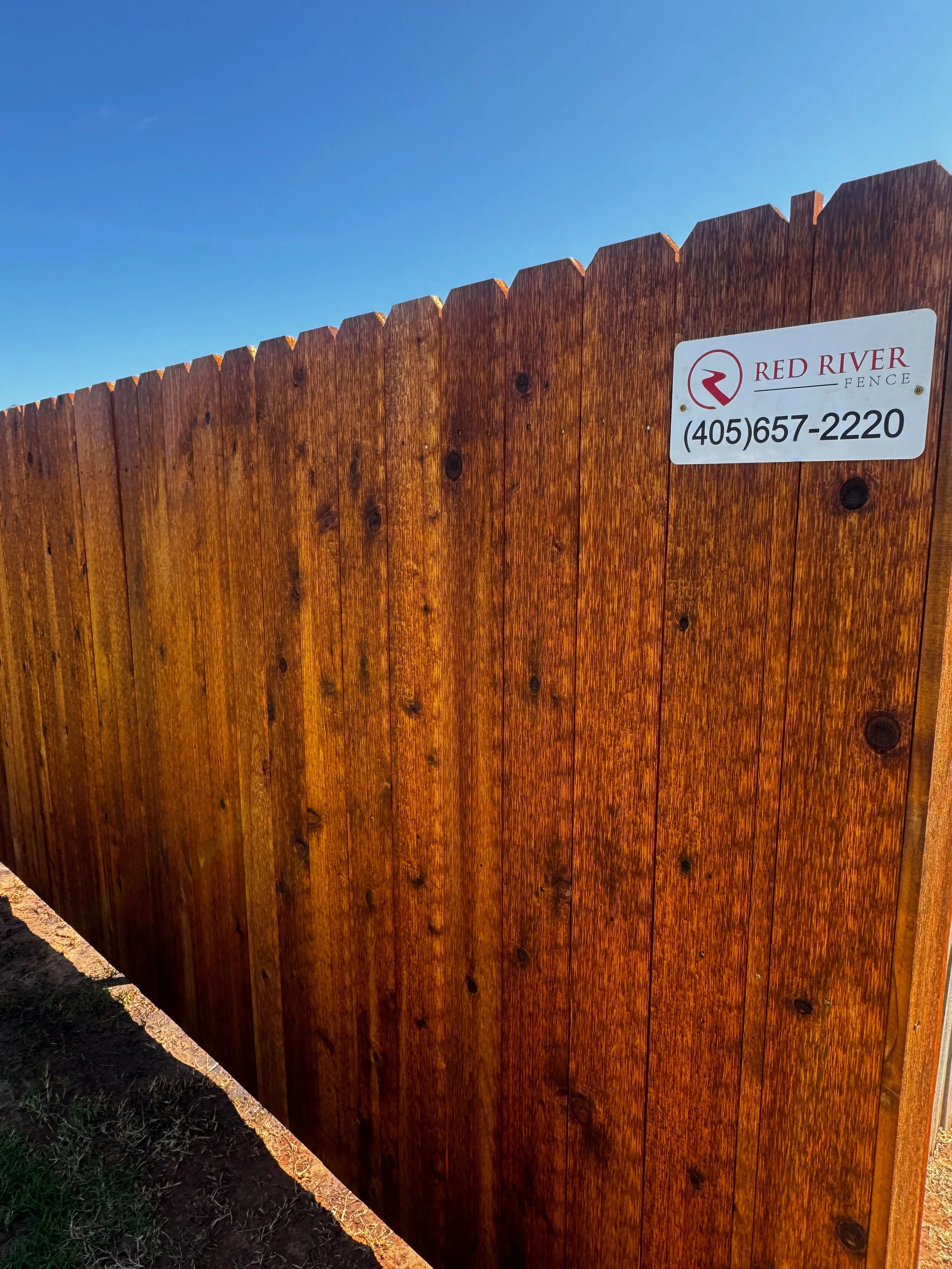 Pre-Stained Cedar Fence vs Spraying After Installation: Why Pre-Staining Gives Better Coverage