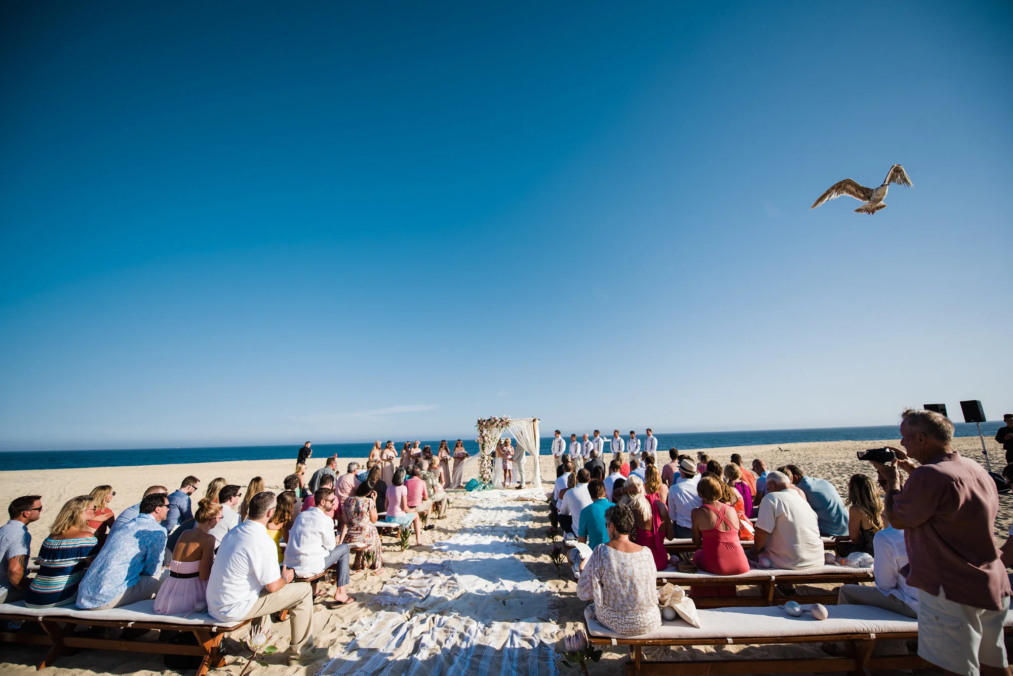 Photography: Walter Wilson Studios Venue: Pueblo Bonito Sunset Beach Florals: Florenta