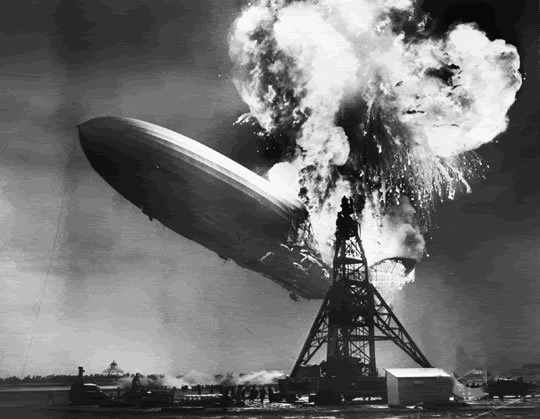 The Hindenburg bursts into flames. The series of photos below shows the airship as it slowly descended – on fire – to the ground.